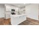 Modern kitchen with white cabinets and stainless steel appliances at 8048 Plymouth Rd, Sherrills Ford, NC 28673