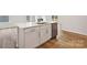 Modern kitchen island with white cabinets and quartz countertops at 8048 Plymouth Rd, Sherrills Ford, NC 28673