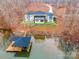 Modern lakefront home with private boat dock at 8092 Edgewater Dr, Norwood, NC 28128