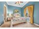 Bright bedroom featuring a white bed frame and yellow curtains at 8128 Bayview Ln, Belmont, NC 28012