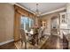 Charming breakfast nook with hardwood floors and elegant window treatments at 8128 Bayview Ln, Belmont, NC 28012