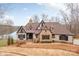 Tudor style home with stone accents and lake views at 8128 Bayview Ln, Belmont, NC 28012