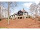 House exterior with stone and wood accents at 8128 Bayview Ln, Belmont, NC 28012