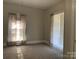 Bedroom with neutral walls and carpet at 907 Sioux St, Monroe, NC 28110