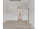 Neutral bedroom with carpet, view of another room, and white doors at 1008 Marquis Hills Dr # Mas0106, Fort Mill, SC 29715