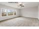 Spacious bedroom with large windows offering a view of the outdoors and a ceiling fan at 1008 Marquis Hills Dr # Mas0106, Fort Mill, SC 29715