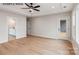 Spacious bedroom featuring hardwood floors, access to a private bathroom, and exterior access to a deck at 1008 Marquis Hills Dr # Mas0106, Fort Mill, SC 29715