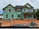 Exterior framing and GreenGuard visible on this home under construction showcasing the progress at 1008 Marquis Hills Dr # Mas0106, Fort Mill, SC 29715