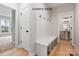 Hallway features a built-in bench with hooks and access to bathroom and other rooms at 1008 Marquis Hills Dr # Mas0106, Fort Mill, SC 29715