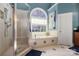 Bathroom featuring tiled shower, soaking tub with window, and tiled flooring at 1016 Antioch Woods Ln # 36, Weddington, NC 28104