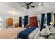 Spacious main bedroom features a tray ceiling, fan, and large windows at 1016 Antioch Woods Ln # 36, Weddington, NC 28104