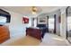 Bright bedroom with a comfortable bed and large windows at 10386 Turnplow Dr, Davidson, NC 28036