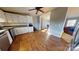 Galley kitchen features stainless steel appliances and white cabinets at 10386 Turnplow Dr, Davidson, NC 28036