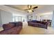 Open living room with a view into the kitchen and dining area at 10386 Turnplow Dr, Davidson, NC 28036