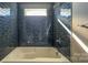 Bathroom with blue tile shower/tub combo at 1057 12Th Avenue Nw Dr, Hickory, NC 28601