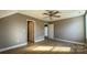 Bright bedroom with hardwood floors and ceiling fan at 1057 12Th Avenue Nw Dr, Hickory, NC 28601