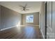 Spacious bedroom with light walls and laminate flooring at 1057 12Th Avenue Nw Dr, Hickory, NC 28601