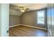 Bright bedroom with ceiling fan and wood-look flooring at 1057 12Th Avenue Nw Dr, Hickory, NC 28601