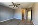 Bedroom with ceiling fan and access to other rooms at 1057 12Th Avenue Nw Dr, Hickory, NC 28601