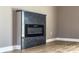 Modern electric fireplace with dark granite surround at 1057 12Th Avenue Nw Dr, Hickory, NC 28601