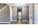 Long hallway with light walls, hardwood floors, and white doors at 1057 12Th Avenue Nw Dr, Hickory, NC 28601