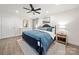 Stylish bedroom showcasing a spacious layout, hardwood floors, and tasteful decor at 11400 Five Cedars Rd, Charlotte, NC 28226