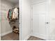 Walk-in closet with shelves and rods to keep your wardrobe well-organized at 11400 Five Cedars Rd, Charlotte, NC 28226