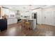 Spacious kitchen with stainless steel appliances, marble countertops, and modern lighting at 11400 Five Cedars Rd, Charlotte, NC 28226