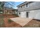 Home's backyard features a patio and deck at 1213 Hartford Ave, Charlotte, NC 28209