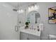 Modern bathroom with updated vanity and shower at 1213 Hartford Ave, Charlotte, NC 28209