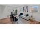 Bright living room with comfy sofa and wood floors at 1213 Hartford Ave, Charlotte, NC 28209