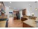 Spacious kitchen featuring wood cabinets, stainless steel appliances and beautiful tile backsplash at 1221 Cochrane Woods Ln, Matthews, NC 28105