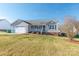 Two-story house with attached garage and front porch at 1243 Glory Ct, Oakboro, NC 28129