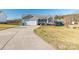 Home's exterior showcasing a long driveway at 1243 Glory Ct, Oakboro, NC 28129