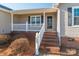 Steps leading to the front door with a porch at 1243 Glory Ct, Oakboro, NC 28129