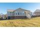 Rear view of charming ranch home with brick foundation at 1243 Glory Ct, Oakboro, NC 28129