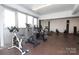 Well-equipped fitness center with stationary bikes and weights at 1300 Reece Rd # G-18, Charlotte, NC 28209