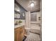 Modern bathroom with a walk-in shower, stylish tilework, and a wood vanity at 1334 7Th Nw St, Hickory, NC 28601