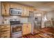 Kitchen with stainless steel appliances and wood cabinets at 1334 7Th Nw St, Hickory, NC 28601