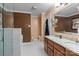 Bathroom boasts dual sinks and a large shower at 145 Ashton Woods Ct, Mount Holly, NC 28120