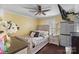 Charming bedroom with a sleigh bed and window seat at 145 Ashton Woods Ct, Mount Holly, NC 28120