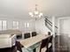 Elegant dining room with hardwood floors and chandelier at 145 Ashton Woods Ct, Mount Holly, NC 28120