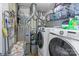 Laundry room with washer, dryer, and storage at 145 Ashton Woods Ct, Mount Holly, NC 28120