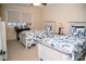 Bright bedroom featuring two beds with nautical-themed bedding at 1723 Oak St, Charlotte, NC 28269