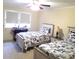 Cozy bedroom with two twin beds and nautical bedding at 1723 Oak St, Charlotte, NC 28269