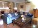 Spacious living room with sectional sofa and coffee table at 1723 Oak St, Charlotte, NC 28269