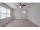 Bright bedroom with ceiling fan and hardwood floors at 1740 Aaron Ave, Rock Hill, SC 29730