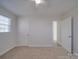 Spacious bedroom with two doors and neutral wall colors at 1740 Aaron Ave, Rock Hill, SC 29730