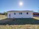 Rear view of a white brick house with a well-maintained lawn at 1740 Aaron Ave, Rock Hill, SC 29730