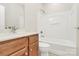 Bathroom featuring a vanity and shower-tub combination at 17563 Hawks View Dr, Fort Mill, SC 29707